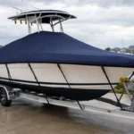 Boat cover straps routed on a trailerable boat to reduce movement and chafing