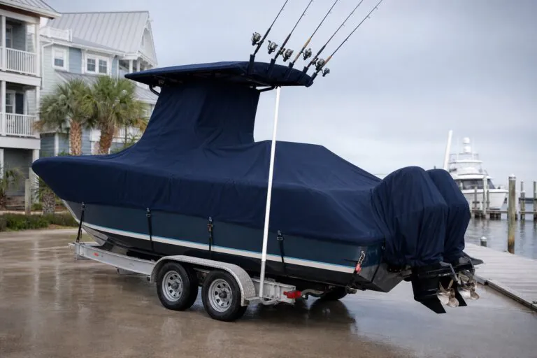 Center console boat with dark navy trailerable cover for Safeboatz fit guide