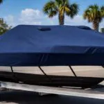 Trailering boat cover with raised vents on a covered boat at a marina